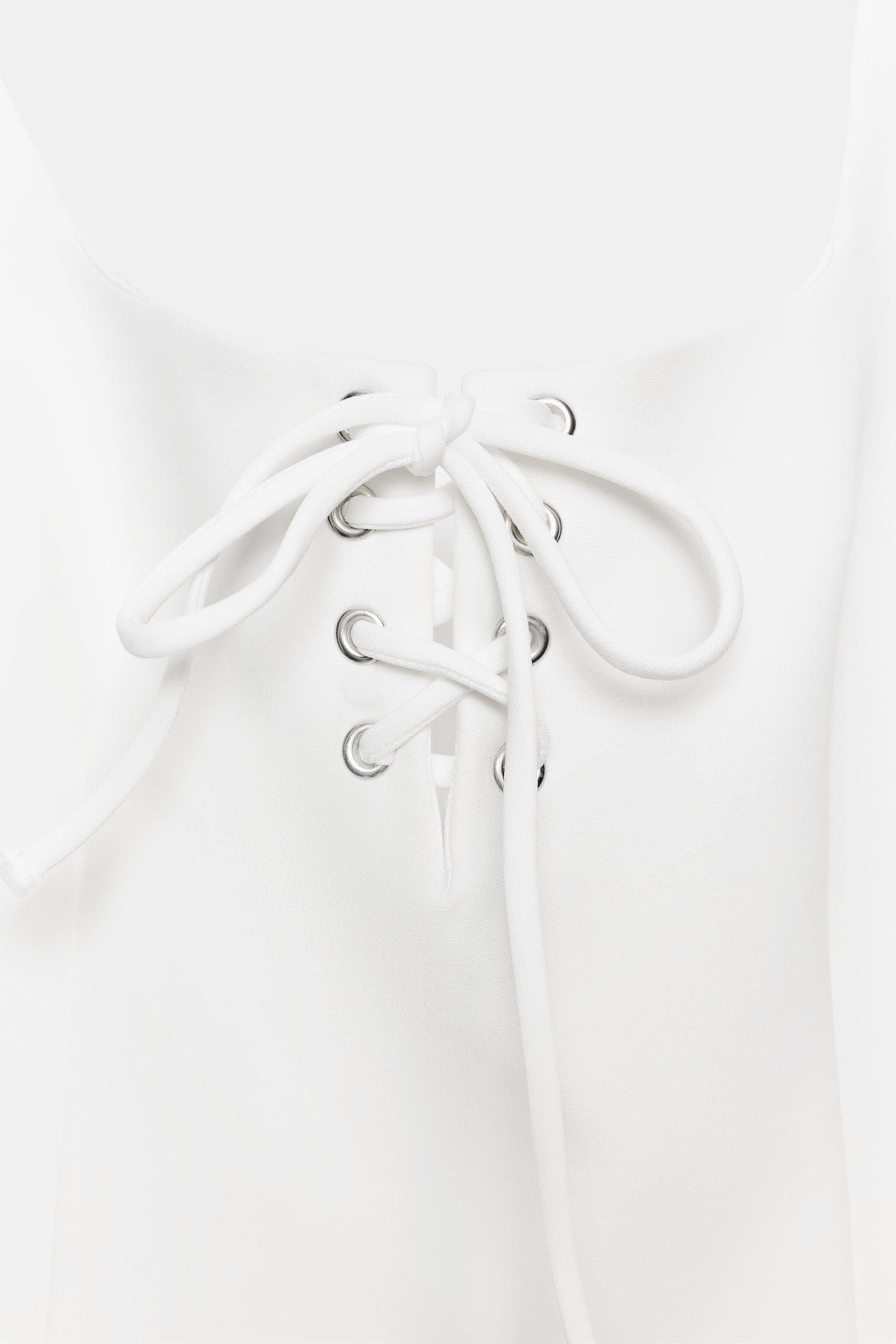 VOLUMINOUS LACE-UP MINI DRESS